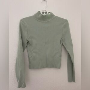 Divided turtleneck crop top